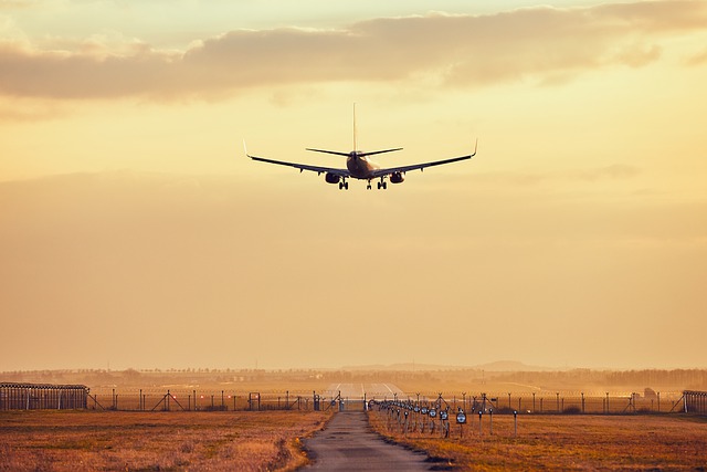 Airplane taking of towards the sunset